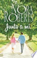 Junto a mí